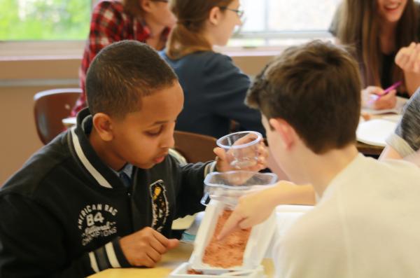 Stream table boys in busy classroom Thumbnail