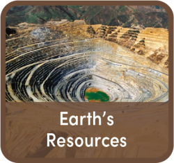 mining hole cut deep into a hillside with the words "Earth's Resources" in front of it